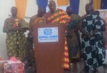 Togbe Afede XIV (middle) addressing the gathering