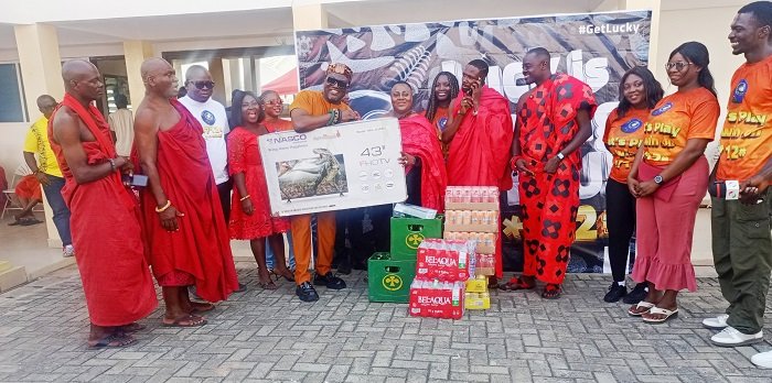 Mr Berko (fifth from left) presenting the items to Nana Akua Abookyi VI