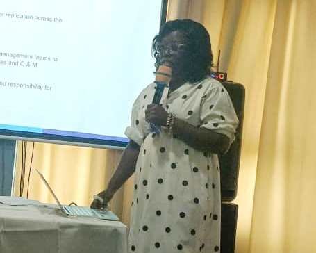 • Augustina Dechegwe Achigibah (inset) making a presentation at the forum