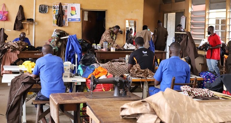 • Inmates learning sewing