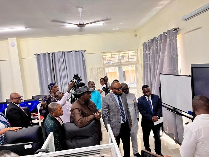 • Mr Adams Sukparu (middle) inspecting the newly commissioned centre