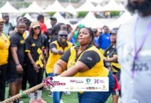 • A lady in a tug-of-war competition