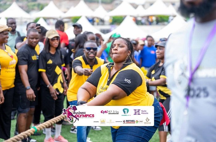 • A lady in a tug-of-war competition
