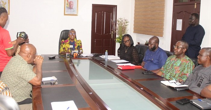 Mrs Emelia Arthur (head of table) addressing the press conference. Photo: Ebo Gorman