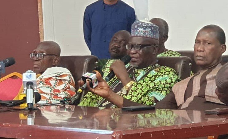 Alhaji Alhasan Bukari (middle) speaking at the programme