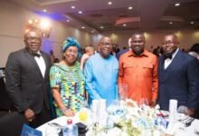 Dr Paul Fynn (middle), Mr Albert Kwabena Dwumfour , President of Ghana Journalists Association (second from right ) and Jacob Fynn ( first from right ) and others at the launch