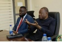 • Dr Pelpuo (right) speaking at the event