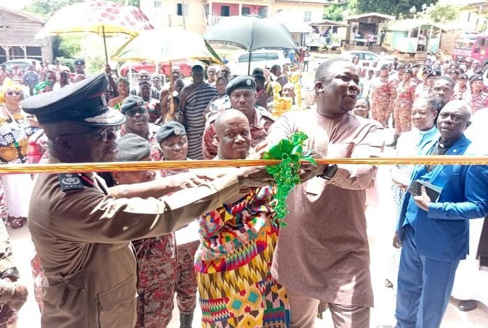 ACFO Osafo Affum, Mr Bobobee, Kyidomhene of the Boso Traditional Area, Nana Akuamoah Kwaw II, cutting the tape to commission the new Fire station