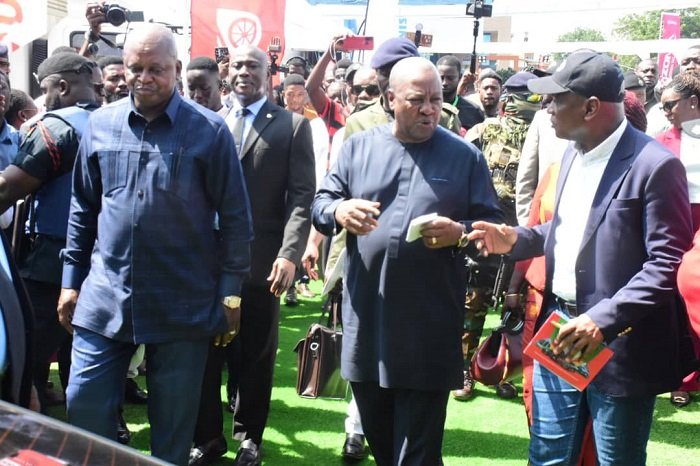 President Mahama (middle)interacting with Torgbe Afede XIV(right) and Mr BukariNikpe after inspecting some products on exhibition Photo Seth Osabukle