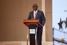 • Mr Madjie (inset) addressing investors in the meeting