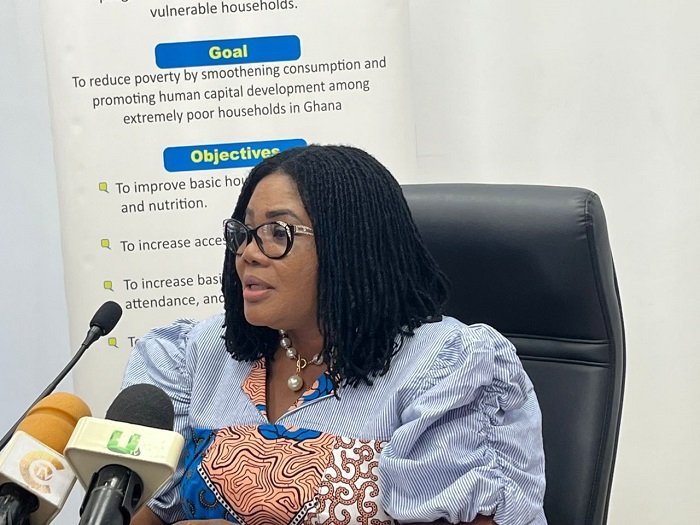 • Dr Lartey briefing the press