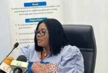 • Dr Lartey briefing the press