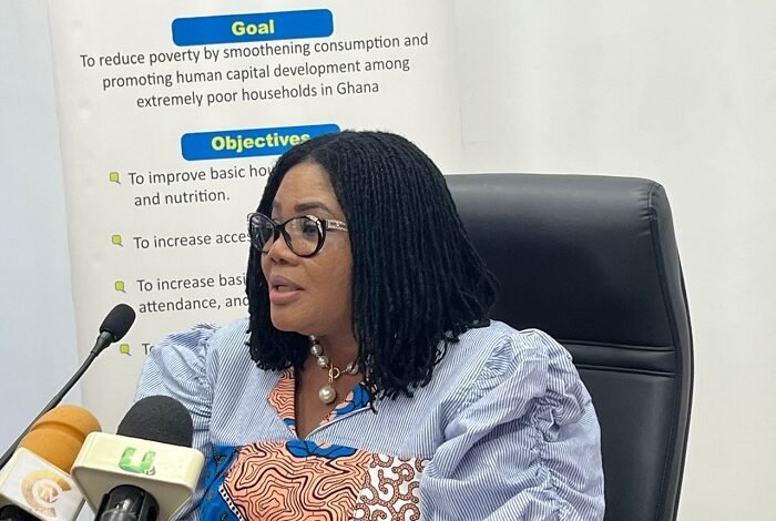 • Dr Lartey briefing the press