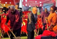 President Mahama (left) with ZhengXiangming (middle) and Ms Dzifa Gomashie cutting the sod for work to begin