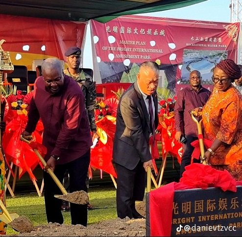 President Mahama (left) with ZhengXiangming (middle) and Ms Dzifa Gomashie cutting the sod for work to begin