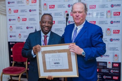• Mr Alex Dadey (left) receiving the award
