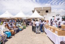 The residents receiving their items