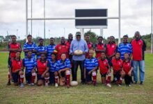 • Mr Ampofo Ankrah with the players and officials