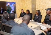 • Mr Salifu (left) interacting with newly recruited staff of the Cote d'Iviore office