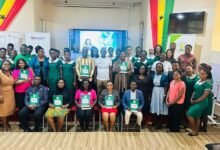 • Mrs Asafo (seated middle) with other participants after the RCCE National dissemination event