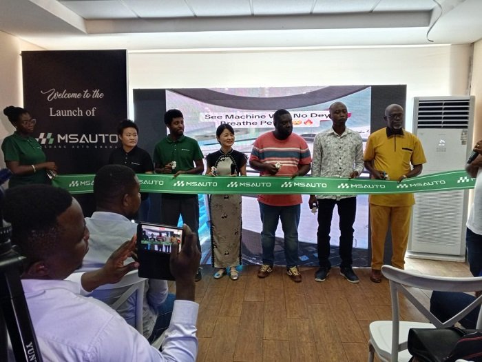 • Ms Jiang (middle) joined by other industry players to cut a ribbon to open the Ghana branch