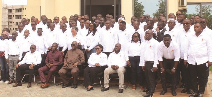 Mr Okletey Terlabi (seated middle),Major (rtd) Joseph Bikanyi Kuyon (seated second from left) with the NADMO regional directors. Photo: Ebo Gorman