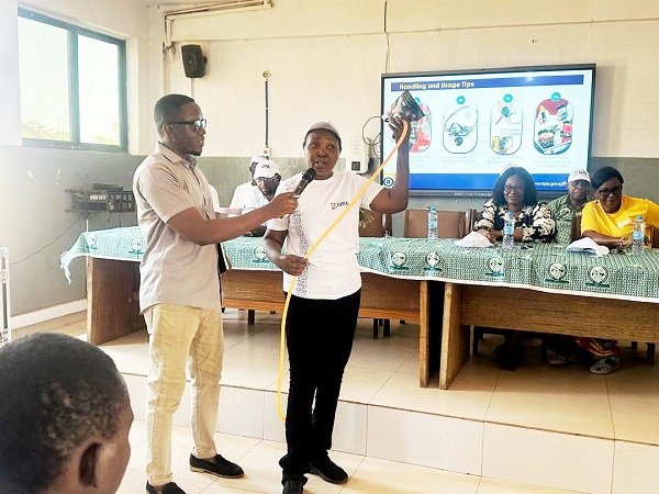 • Mrs. Budu Nyarko (right) during an outreach programme with the students