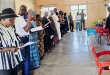 • Mr Anthony Ziniel (infront) swearing in the committee members