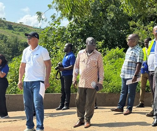 • Mr Mutawakilu (left) with management of GWL inspecting the impact of activities of developers on the intake Plant