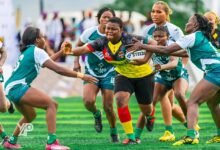 • Nigeria players attempting to stop Ghana's forward Henrietta Arhin