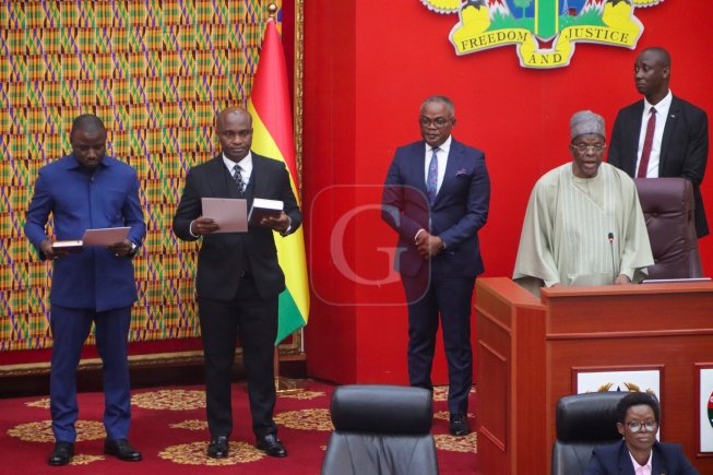 • Mr Alban Bagbin (right) swearing in the two MPs