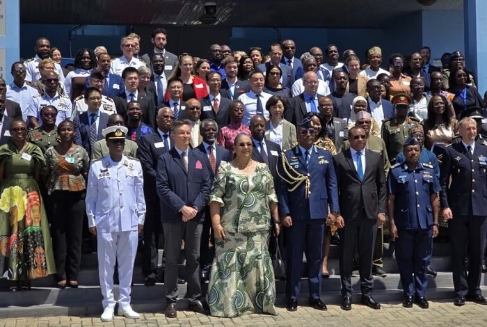 • Ms Hanna Tetteh (middle) with officers and dignitaries after the programme