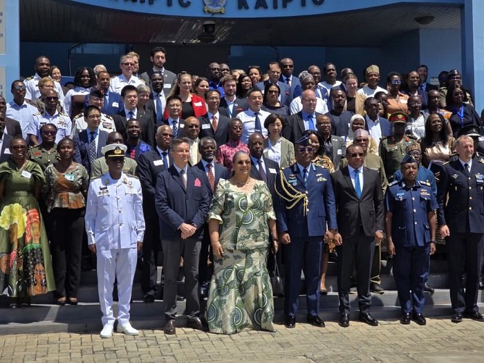 • Ms Hanna Tetteh (middle) with officers and dignitaries after the programme