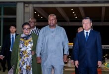 • President Mahama (middle) with wife and Chinese officials at the meeting