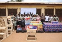 • Mr Nadine Jaber with authorities and students after the donation
