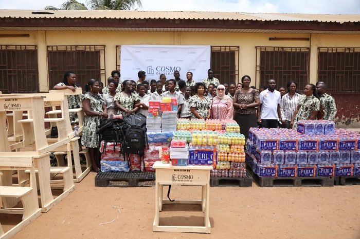 • Mr Nadine Jaber with authorities and students after the donation