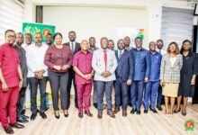 • Professor Kpassa Whyte (middle) with members of SIGA and journalists
