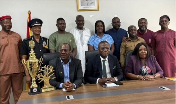 • The Minister with members of the Committee