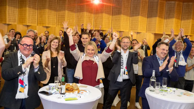 The Olympic supporters celebrate the result