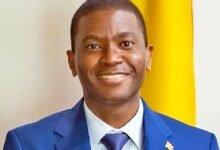 The Prime Minister of Grenada, Dickon Amiss Thomas Mitchell