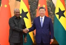 • Mahama and Xi Jinping in a handshake