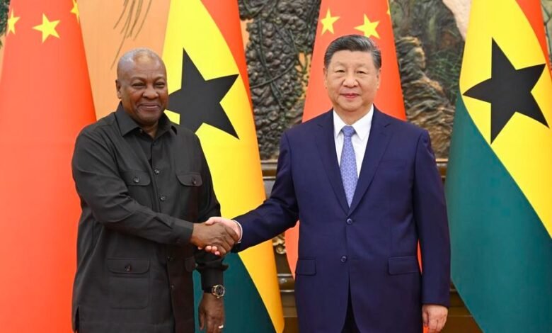 • Mahama and Xi Jinping in a handshake