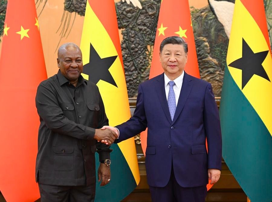 • Mahama and Xi Jinping in a handshake