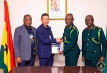 • Rev. Dominic Yeo (second from left) with Mr Samuel Basintale Amadu (second from right) and other dignitaries at the meeting