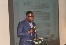 Mr Andrew Ackah (inset) addressing stakeholders at the AGM. Photo. Ebo Gorman