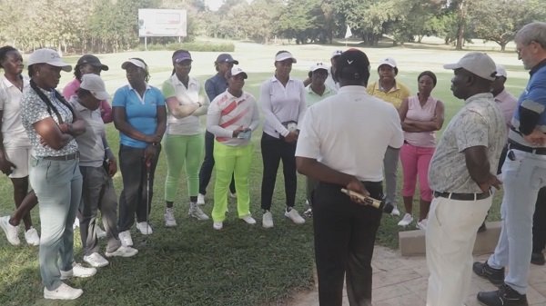• Alhaji Ahmed Padori interacting with some of the golfers