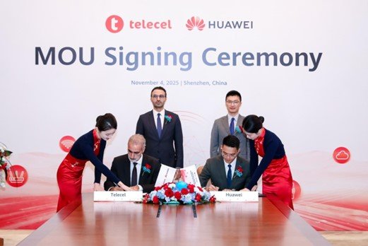 Business leaders from Telecel Group and Huawei signing the MoU