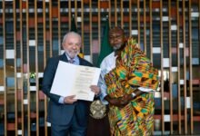 President Luiz Inacio da Silva with Ambassador Namoale (right)