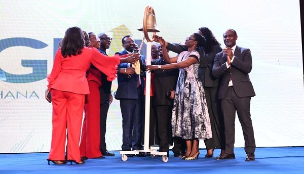 • Mrs Amoah (third from right) with other dignitaries ringing the GSE bell to mark the 10th anniversary of GFIM