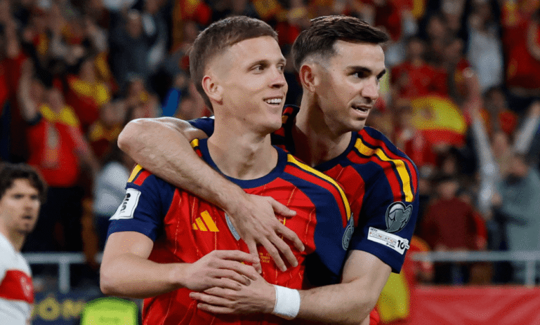 Dani Olmo (left) and Mikel Oyarzabal (celebrating his goal during match